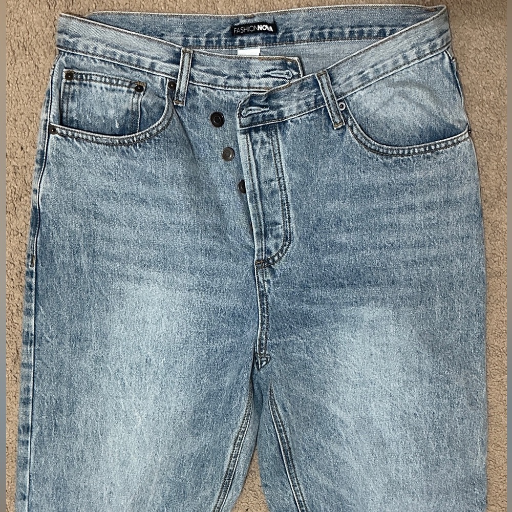 Fashion Nova Women cross over straight leg 
 Light Blue Relaxed Jeans size 11